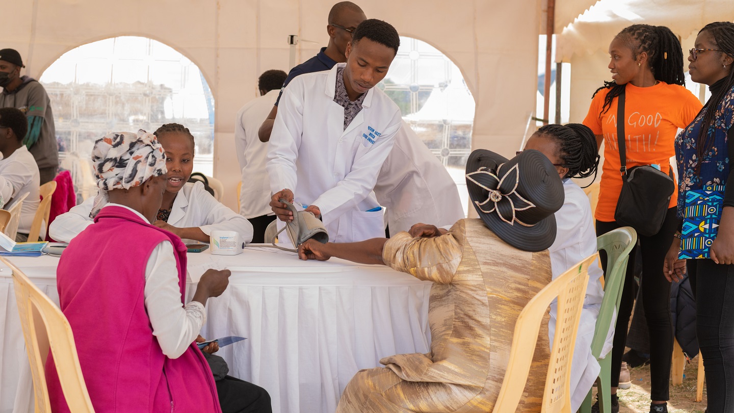 People in Kenya gathering to receive heath solutions