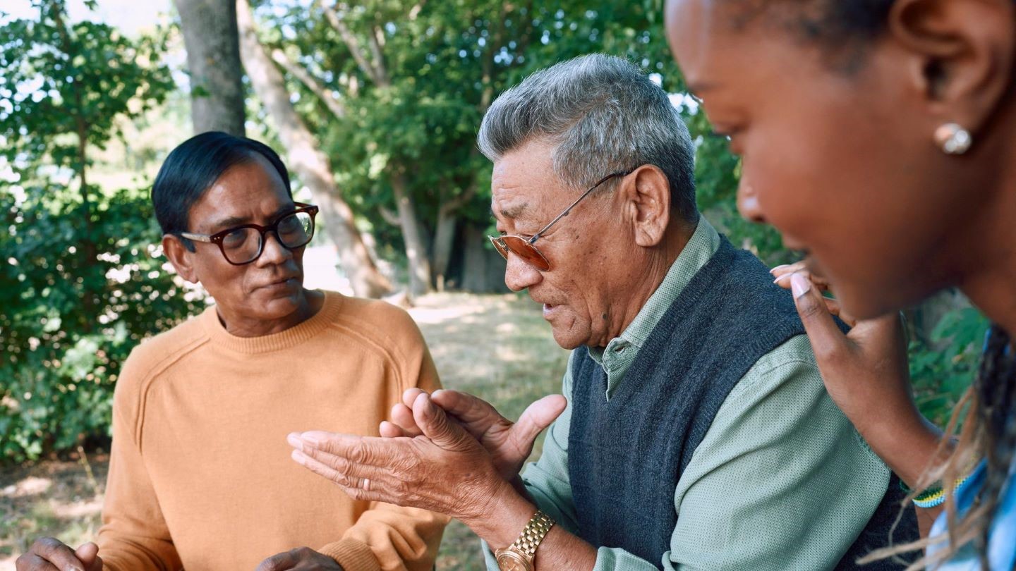 Image of people engaging outdoors