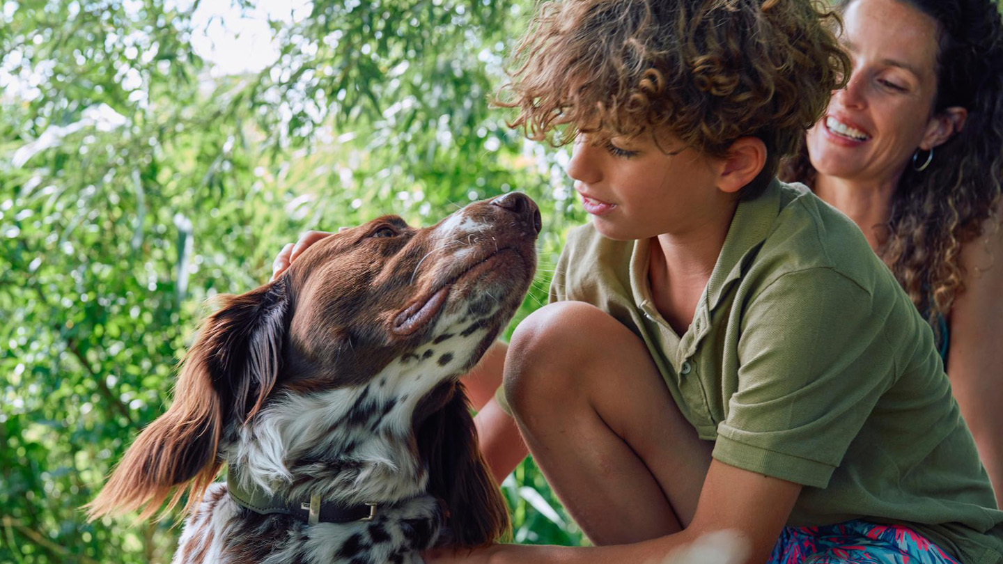 Dog with woman and boy